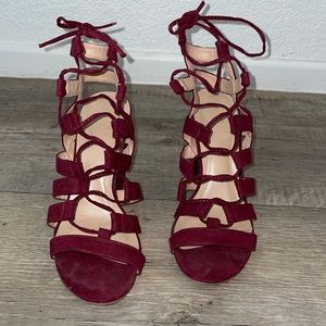 Women Size 7. Burgundy lace up heels.